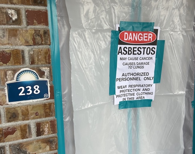 Signage for an asbestos fireproofing abatement removal project in Everett WA